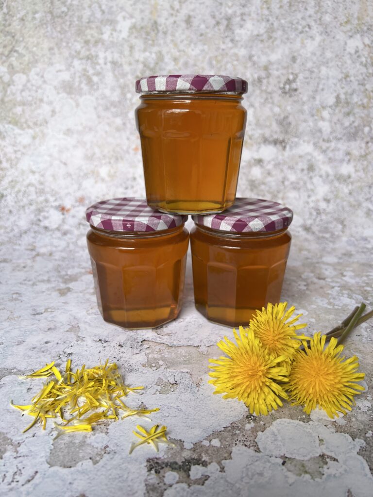 Three jars of dandelion honey