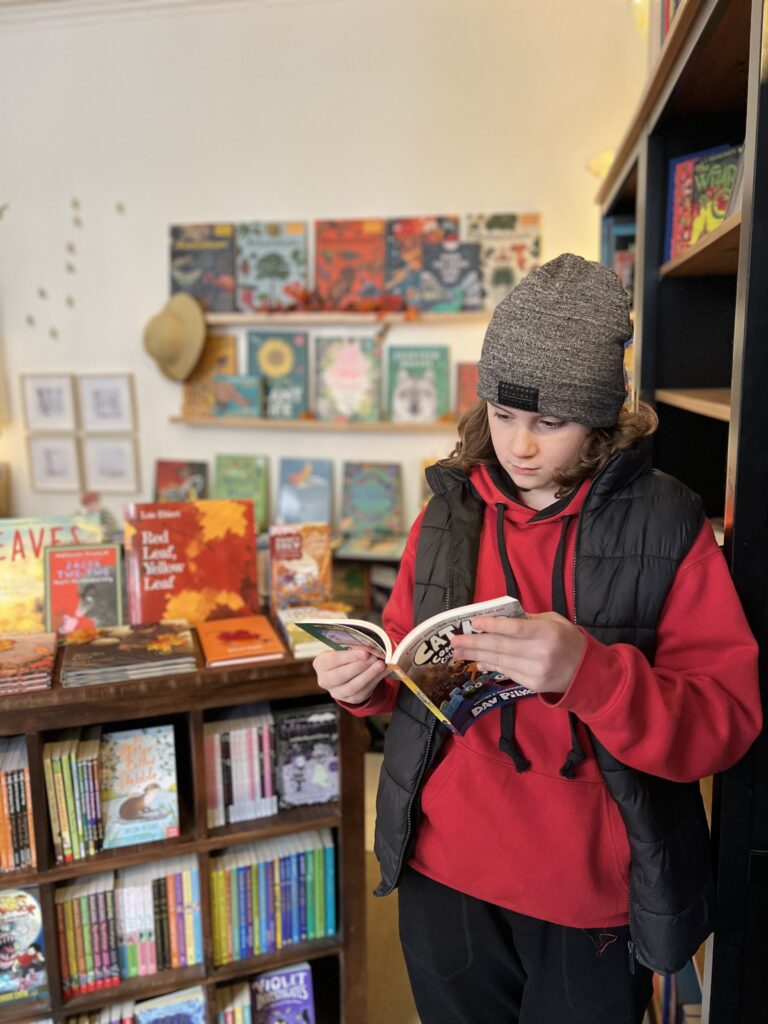 Ginger and Pickles Children's Bookshop boy reading