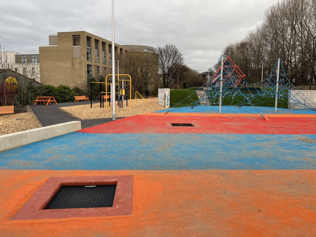 Dalry Playground with trampolines and a rope climbing structure